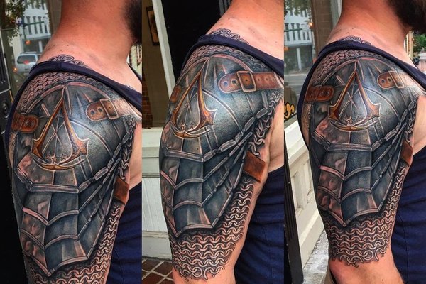 1615334858_28-p-muzhskie-tatu-dospekhi-na-ruke-28.jpg