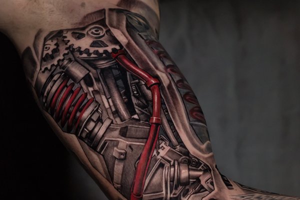 Biomechanical-realistic-3d-zbrush-biceps-arm-Black-and-grey-tattoo-Shamack-Inkden