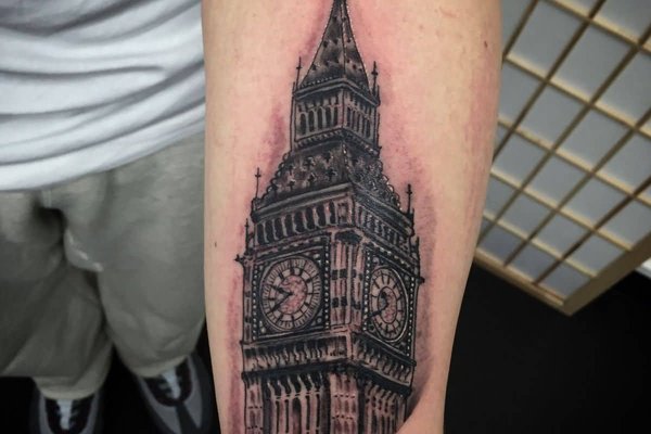 Black-And-Grey-Big-Ben-Tattoo-On-Left-Forearm.jpg